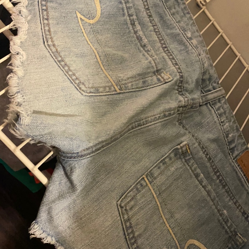 Shorts with lace pockets
